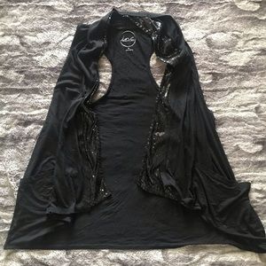 Sleeveless black cardigan with sequin detail